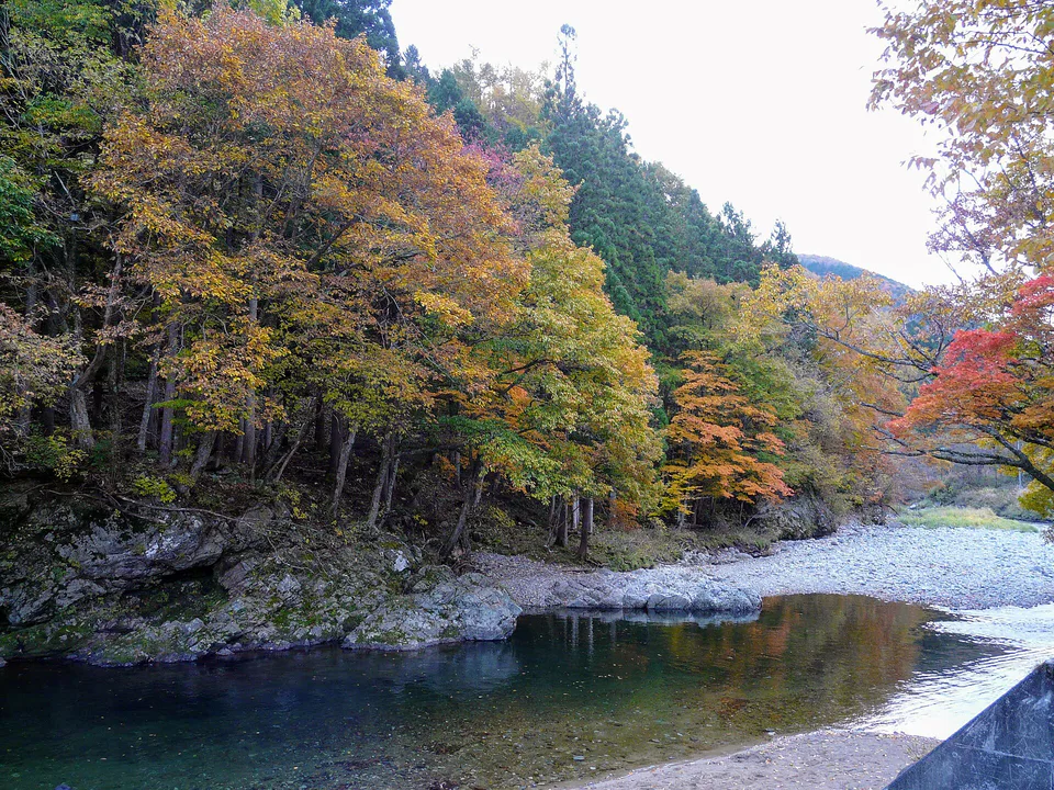 Hida Folk Village and autumn hills in Takayama during the late-October Central Japan foliage season
