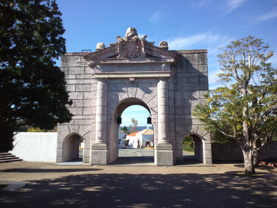 Gate of Pomegranates at Shima Spain Village, where ticket value depends on park hours and the transport package used to reach Shima