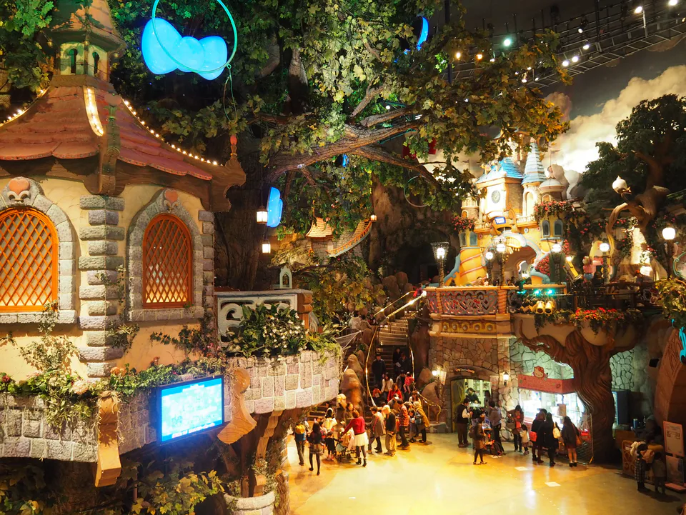 Indoor Sanrio Puroland guest area used to explain family movement, stroller limits and parade timing
