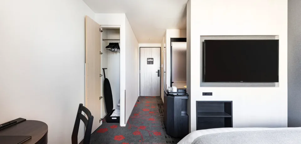 Chambre pour plusieurs personnes officielle à l’Hôtel Hankyu RESPIRE OSAKA.
