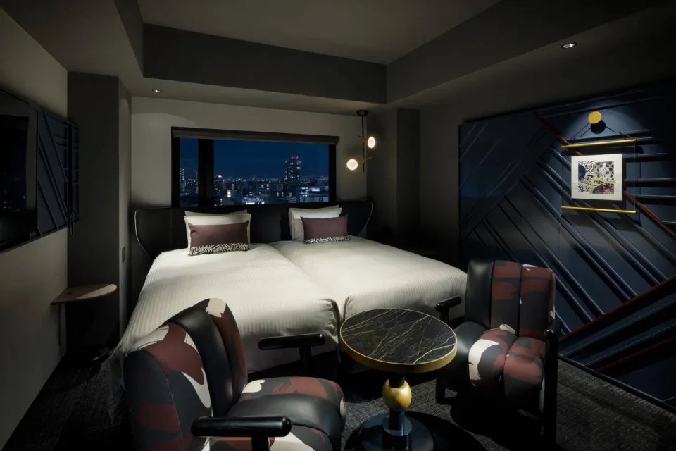 Mercure Tokyu Stay Osaka Namba guest room with queen bed and designer furnishings