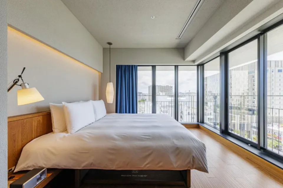 Southwest Grand Hotel Okinawa king room with balcony and city view