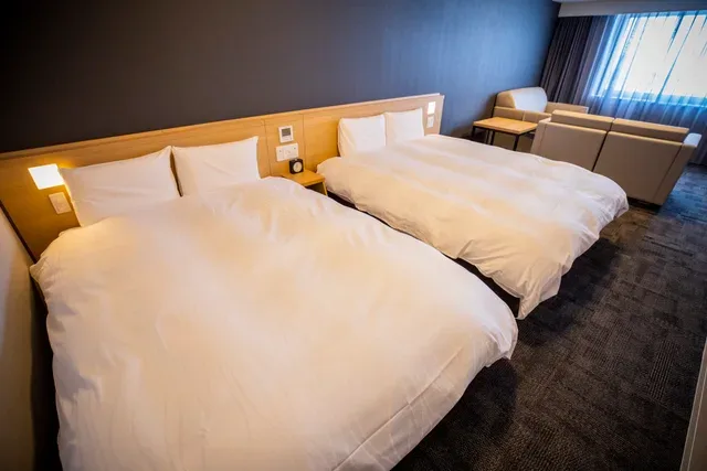 La Vista Furano Hills spacious guest room with seating area