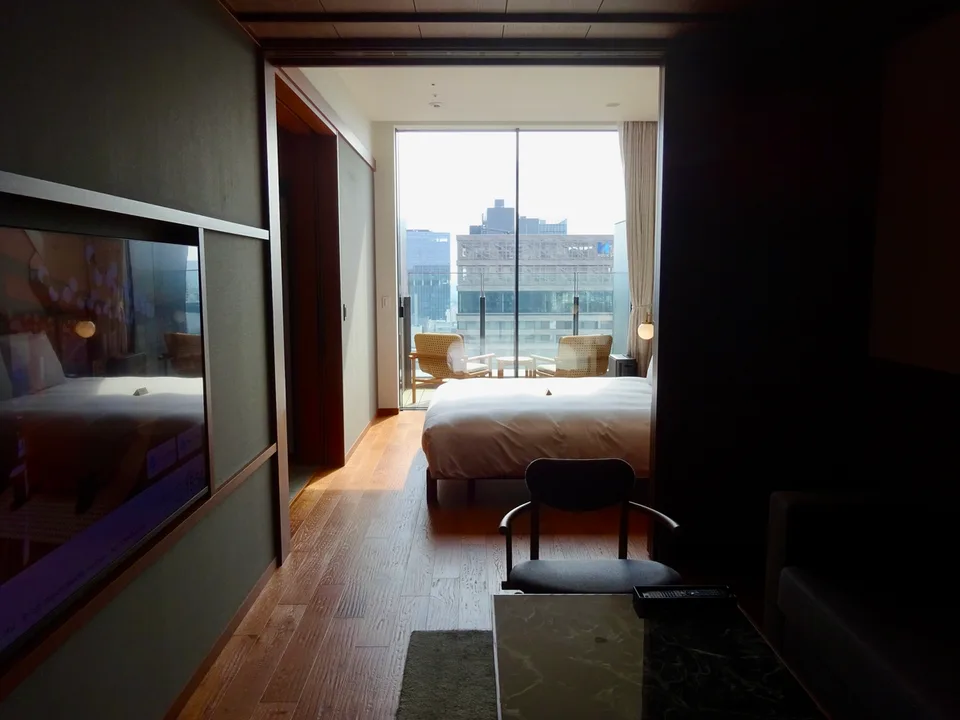 ONE FUKUOKA HOTEL terrace room illustrating hotel time and Tenjin skyline views