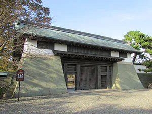 Surviving Honmaru Gate beside the reconstructed keep at Matsumae Castle in southern Hokkaido
