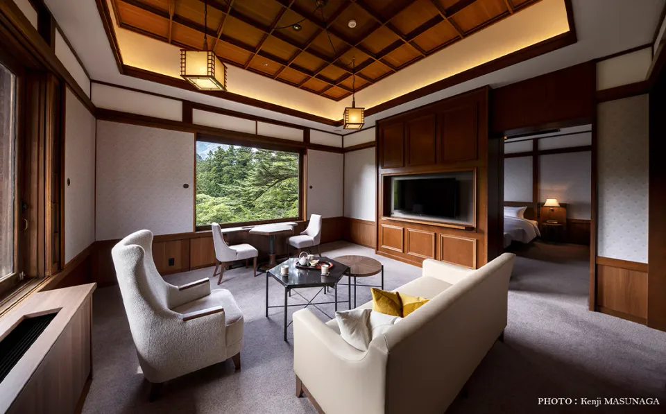Nikko Kanaya Hotel Annex Suite with classic furnishings and two large windows