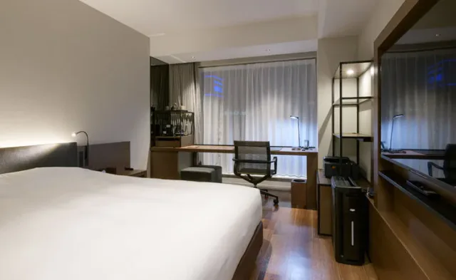 Guest room at ReLabo MedicalSpa and Stay directly connected to Aomori Station