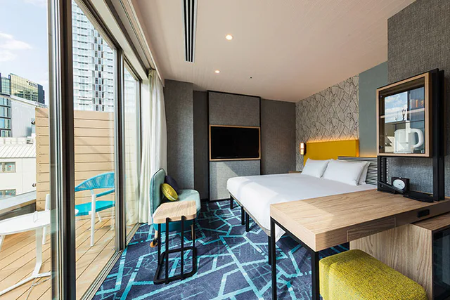 ห้องพักและพื้นที่เตียงของ JR East Hotel Mets Premier Akihabara