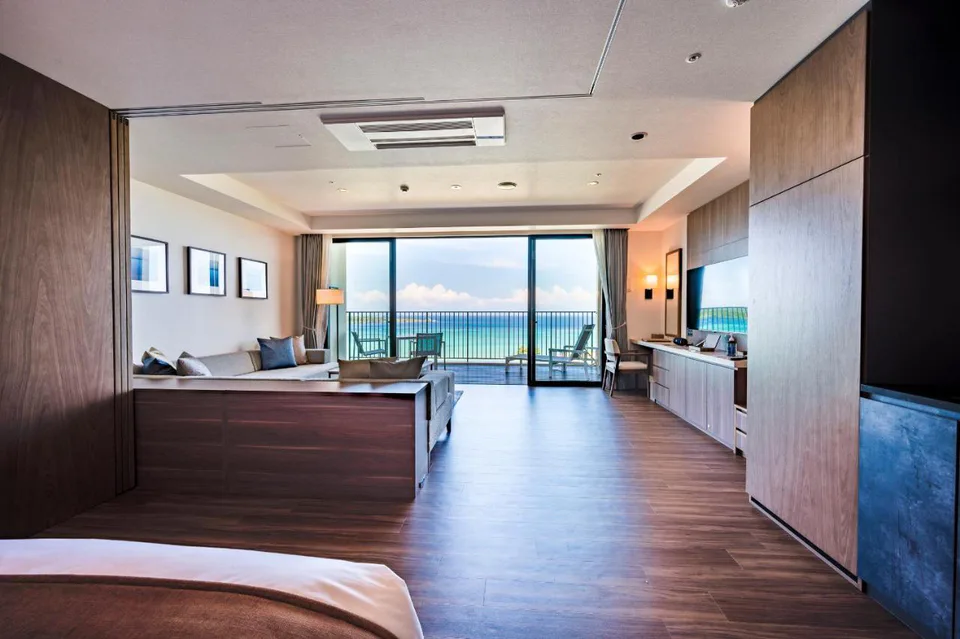 HIYORI Ocean Resort Okinawa Ocean Suite with living area and ocean-facing terrace