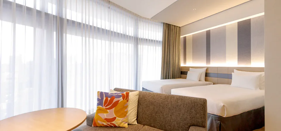 JR Kyushu Hotel Blossom Naha deluxe twin guest room