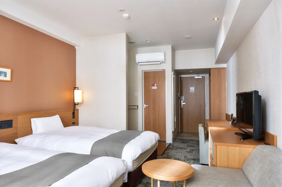 Les chambres et l'espace de couchage de l'hôtel Vessel Hotel Campana Okinawa