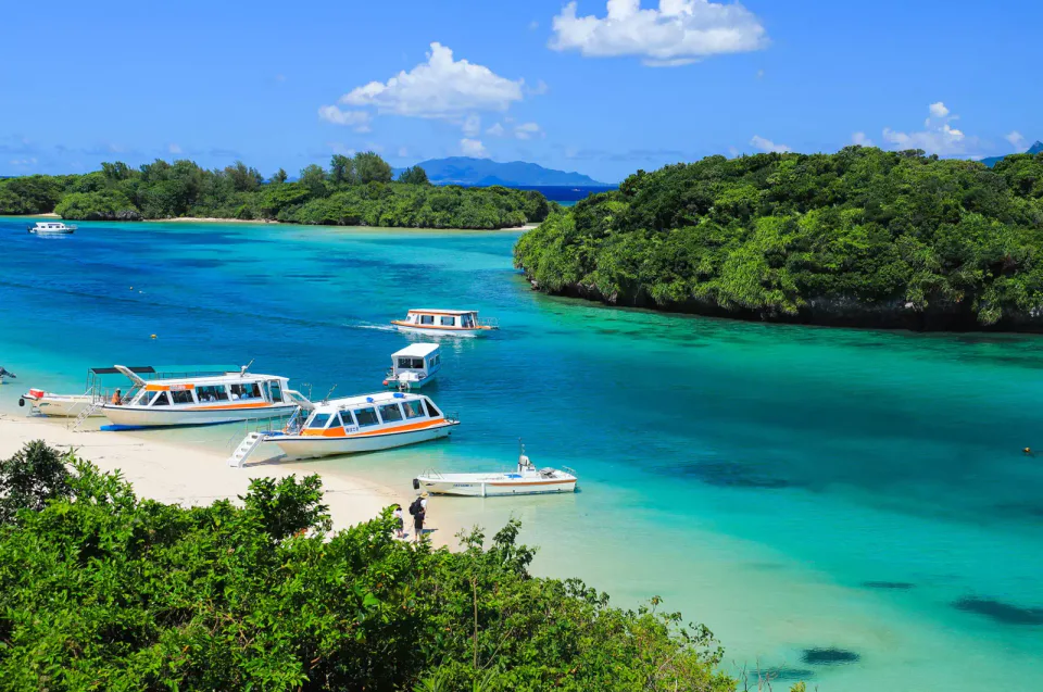 Diver exploring the clear tropical waters of the Yaeyama Islands around Ishigaki