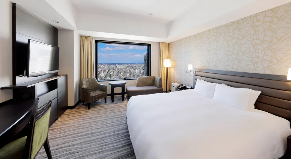 JR Tower Hotel Nikko Sapporo Superior Double room seating and city view