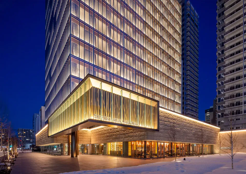 SAPPORO HOTEL by GRANBELL exterior for solo travellers comparing a longer station walk with a hot-spring spa