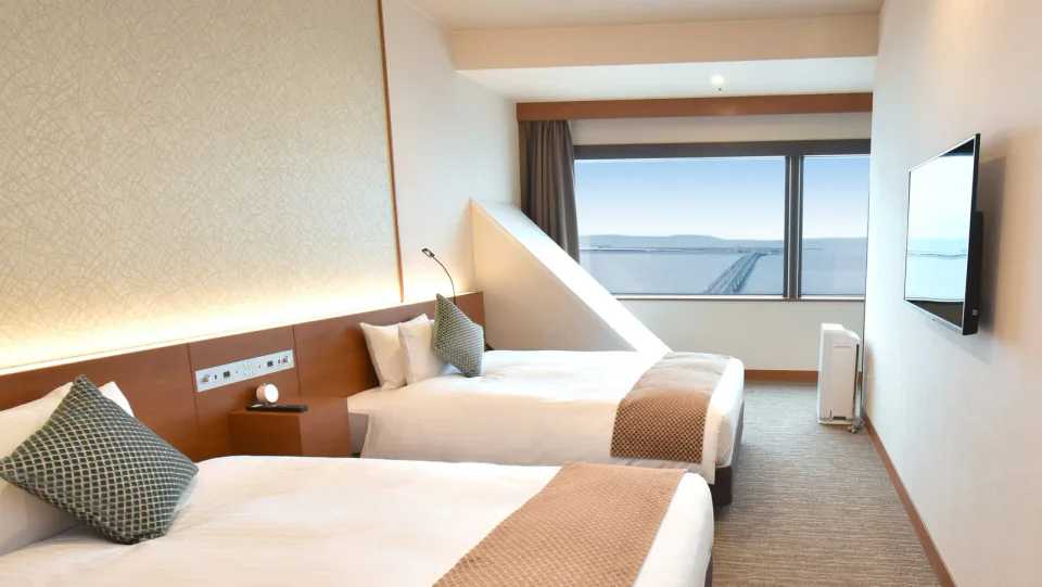 Odysis Suites Osaka Airport Hotel standard twin room near Rinku Town