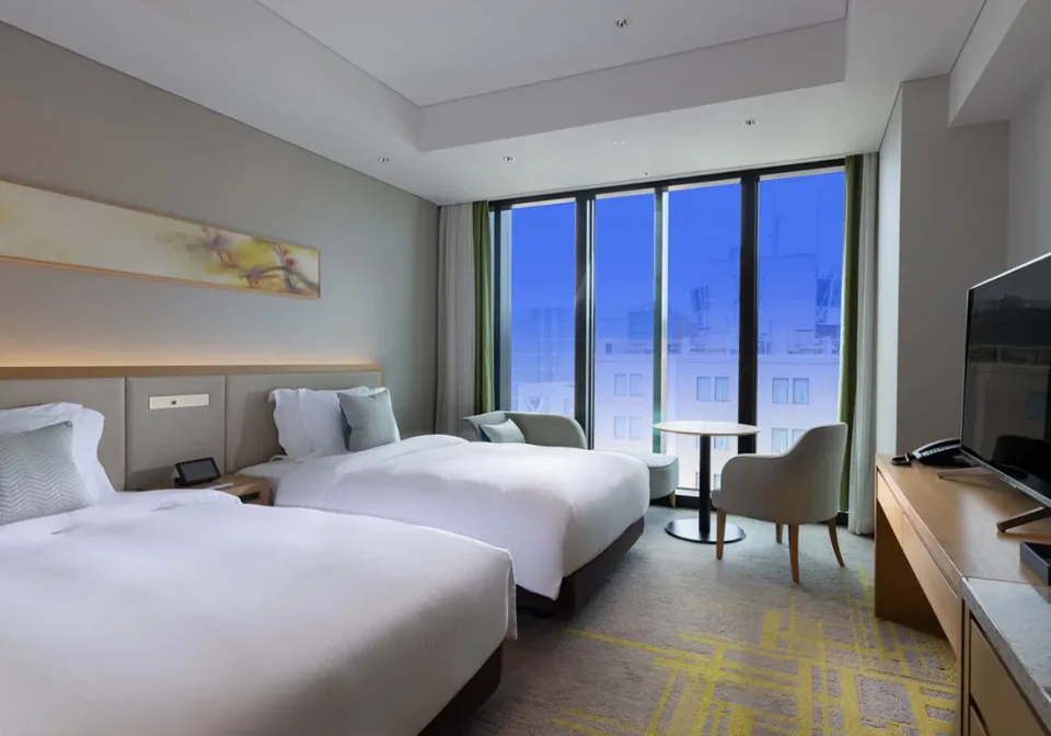 Miyako Hotel Hakata Superior Twin room with full-height window beside Hakata Station
