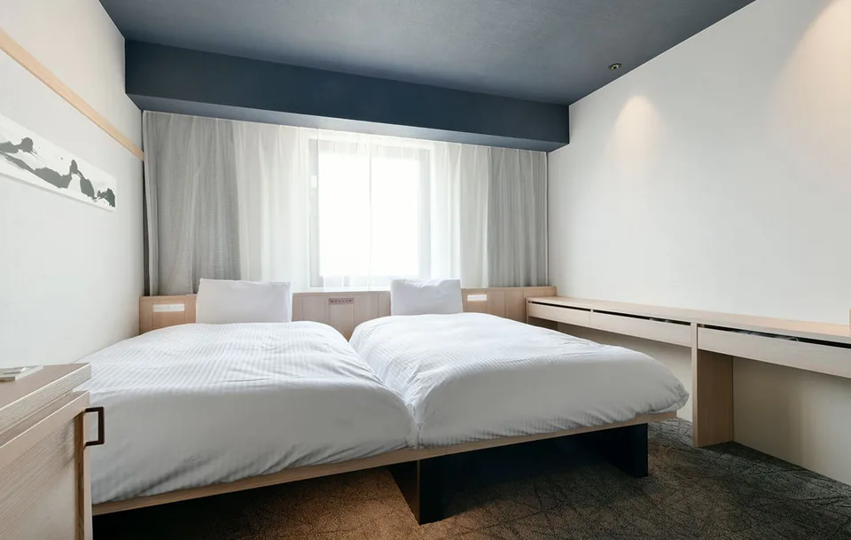 Chambres et espace de couchage de l'hôtel Vessel Hotel Campana Susukino