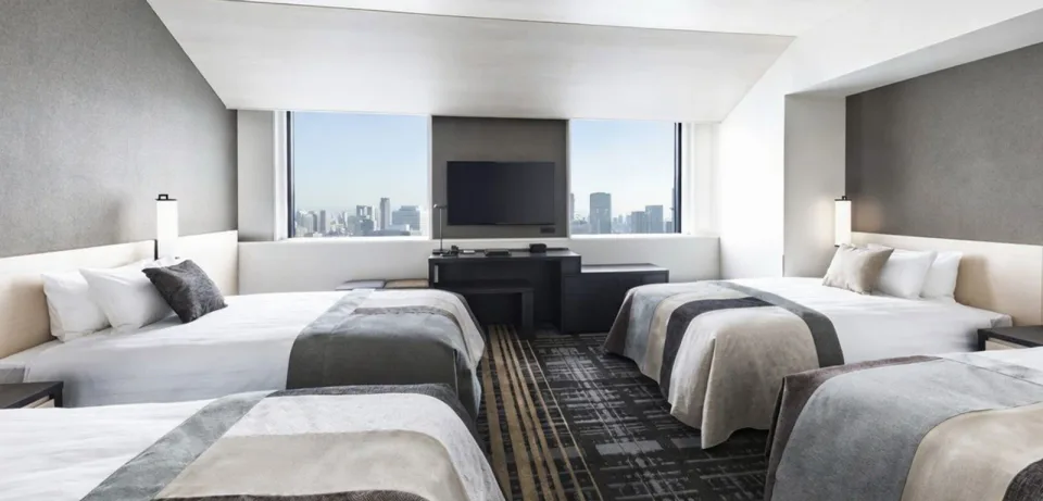 Chambres et espace de couchage à The Park Front Hotel