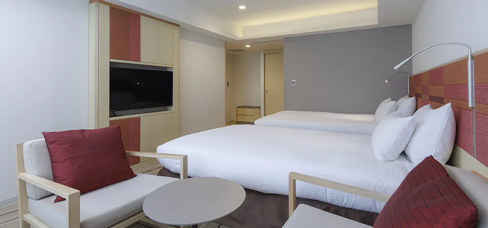JR KYUSHU HOTEL Blossom Hakata Chuo Deluxe Twin โดยใช้เตียงดึงออกเป็นที่นอนสำหรับผู้ใหญ่คนที่ 3