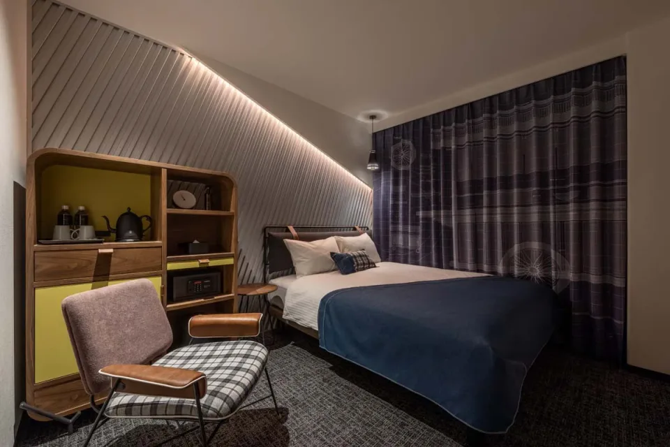 THE LIVELY FUKUOKA HAKATA guest room with bed and window seating
