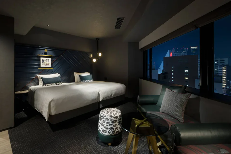 Mercure Tokyu Stay Osaka Namba room with beds and city-facing window