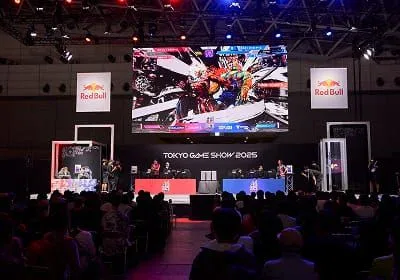 Visitors exploring game exhibits on the Tokyo Game Show event floor