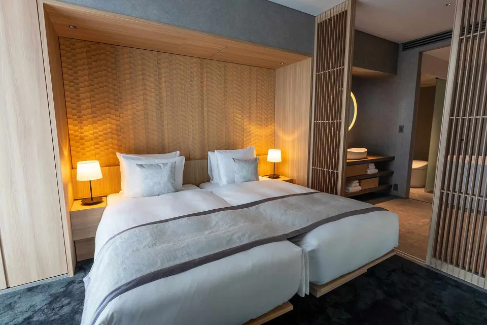 MUWA Niseko twin-bedroom suite with alpine interior