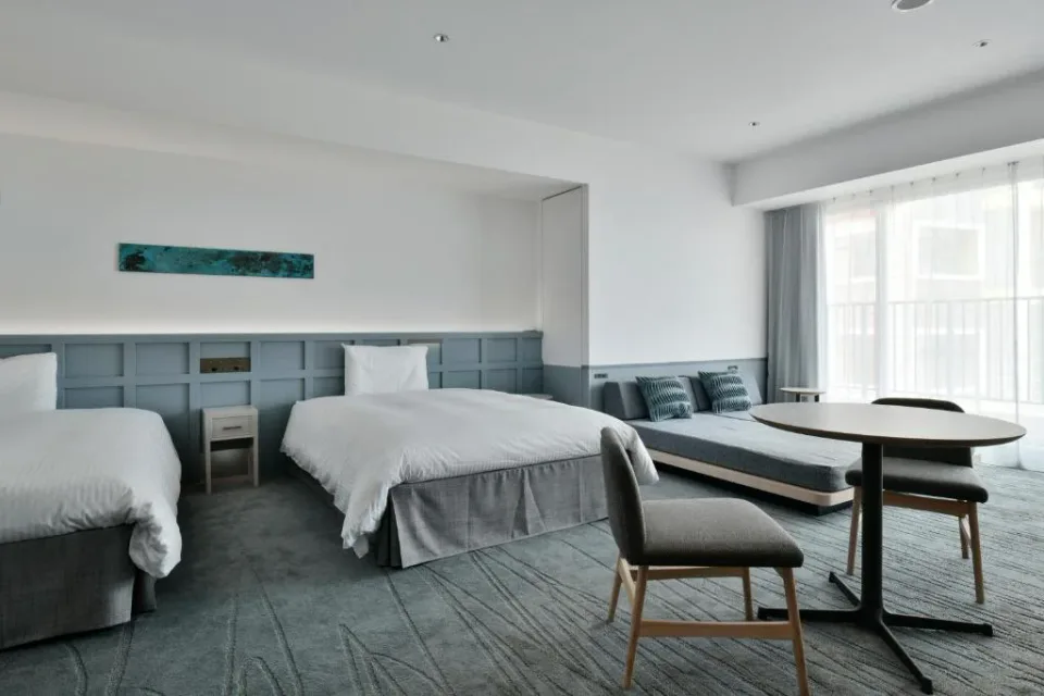 Lequ Okinawa Chatan Spa and Resort modern suite with two beds