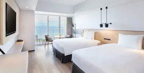 Hilton Okinawa Sesoko Resort guest room with two beds