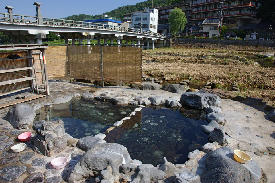 Misasa Onsen riverside hot-spring district for deciding whether an overnight ryokan stay is worth the bus transfer from Kurayoshi