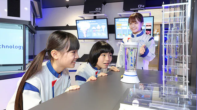 Children at the Simulation Technology Center inside KidZania Fukuoka, one of the indoor activities that keeps the attraction useful on rainy days