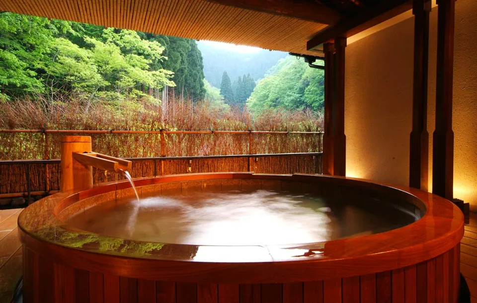 Private open-air onsen bath at Nishimuraya Hotel Shogetsutei in Kinosaki