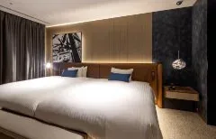 Hotel Intergate Osaka Umeda suite bedroom with king bed