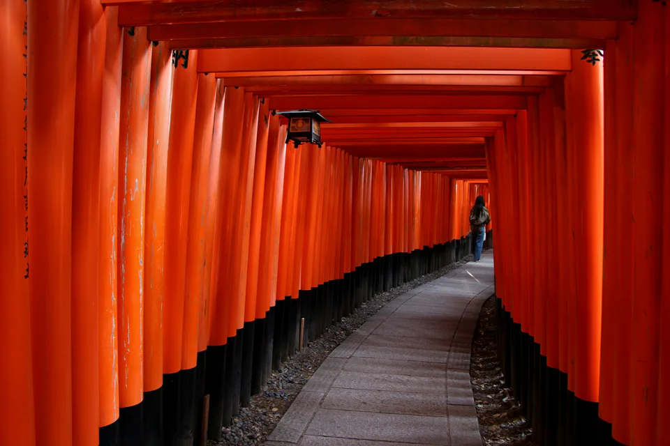 Vermilion torii gates along the Fushimi Inari shrine route in Kyoto