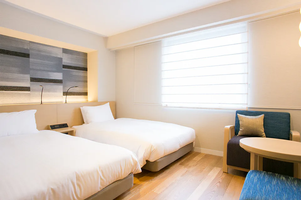 Nishitetsu Hotel Croom Hakata Comfort Twin illustrating the compact-room trade-off
