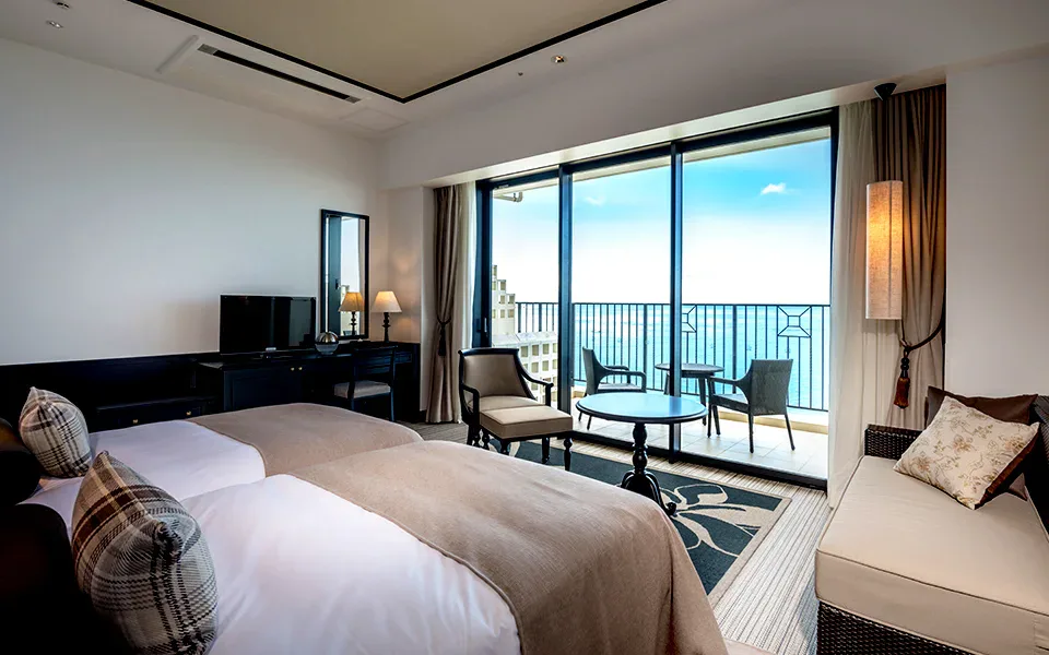 Hotel Monterey Okinawa Spa and Resort superior room with ocean-facing balcony