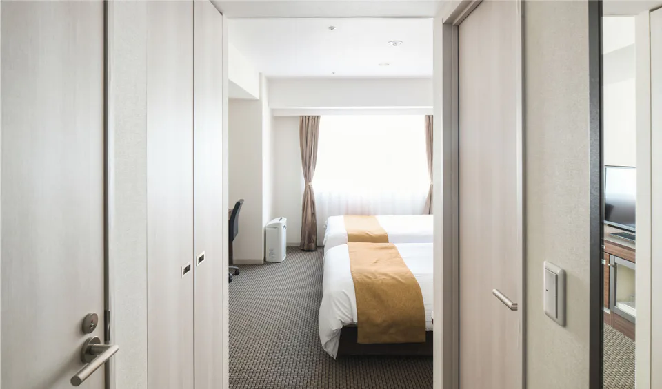 Vessel Inn Sapporo Nakajima Park的客房與床鋪空間