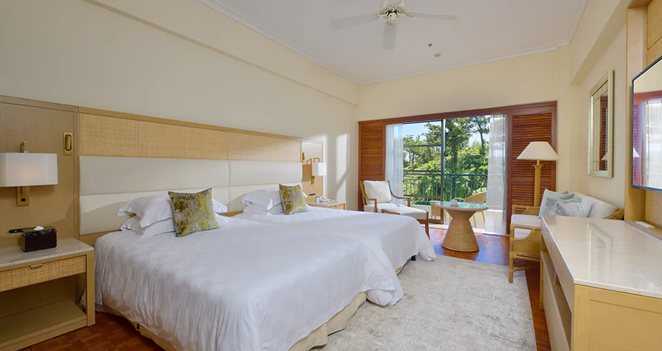 Les chambres et l’espace de couchage du Naha Terrace Naha
