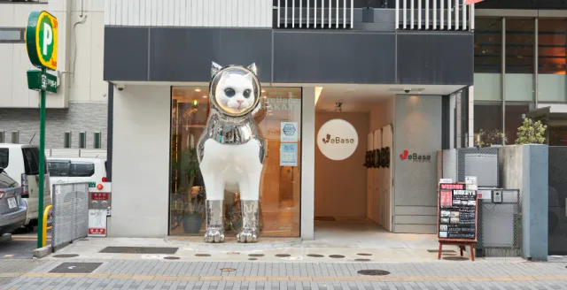 WeBase HAKATA entrance with its landmark cat sculpture
